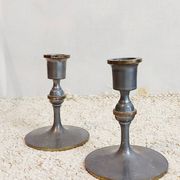 Pair of pewter candle holders