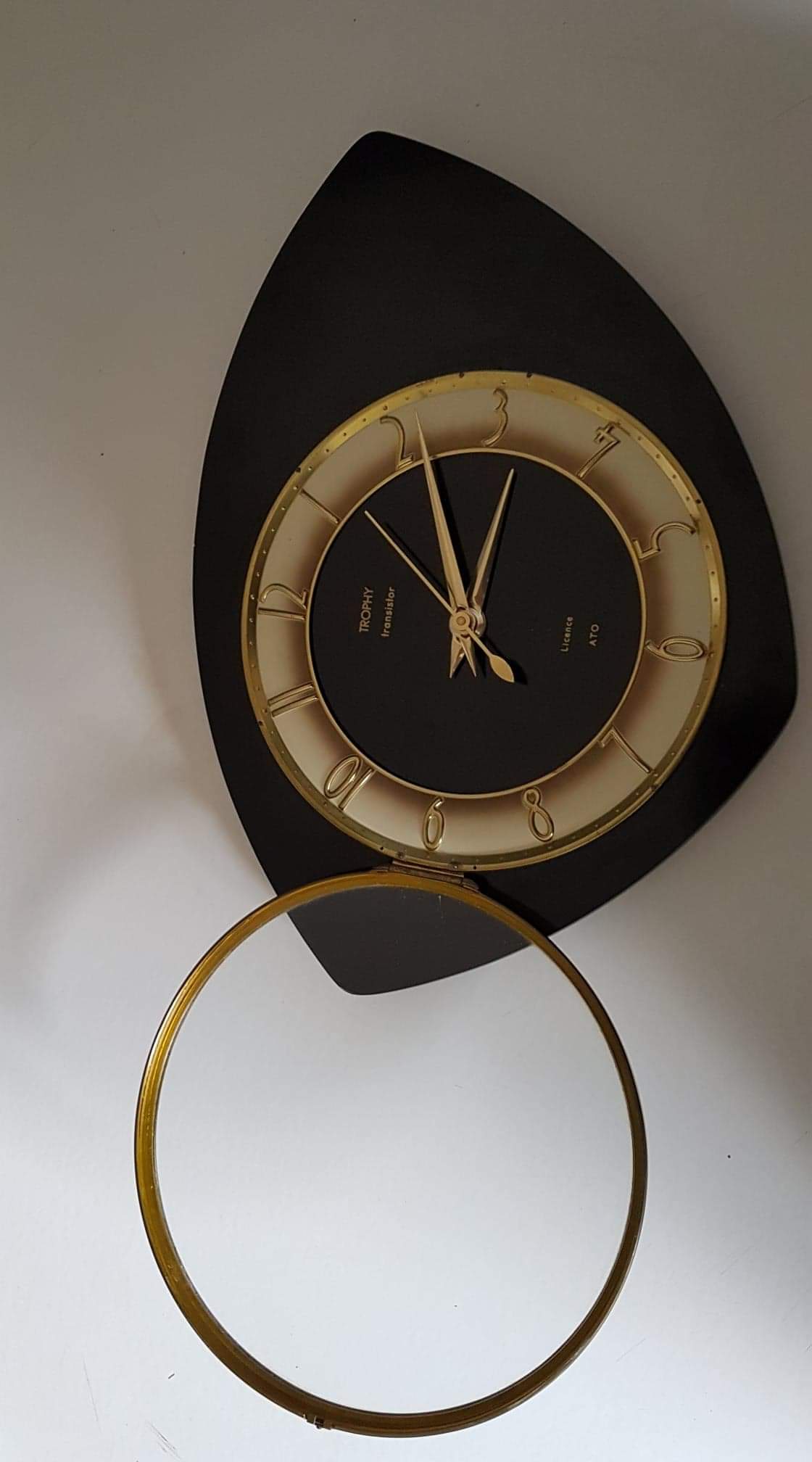 Black and gold formica wall pendulum mark Trophy Transistor