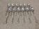 12 silver-plated metal coffee spoons by Boulenger, coffee bean design, 11cm.