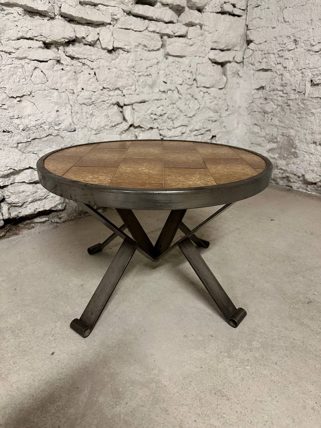 Vintage round ceramic and wrought iron coffee table