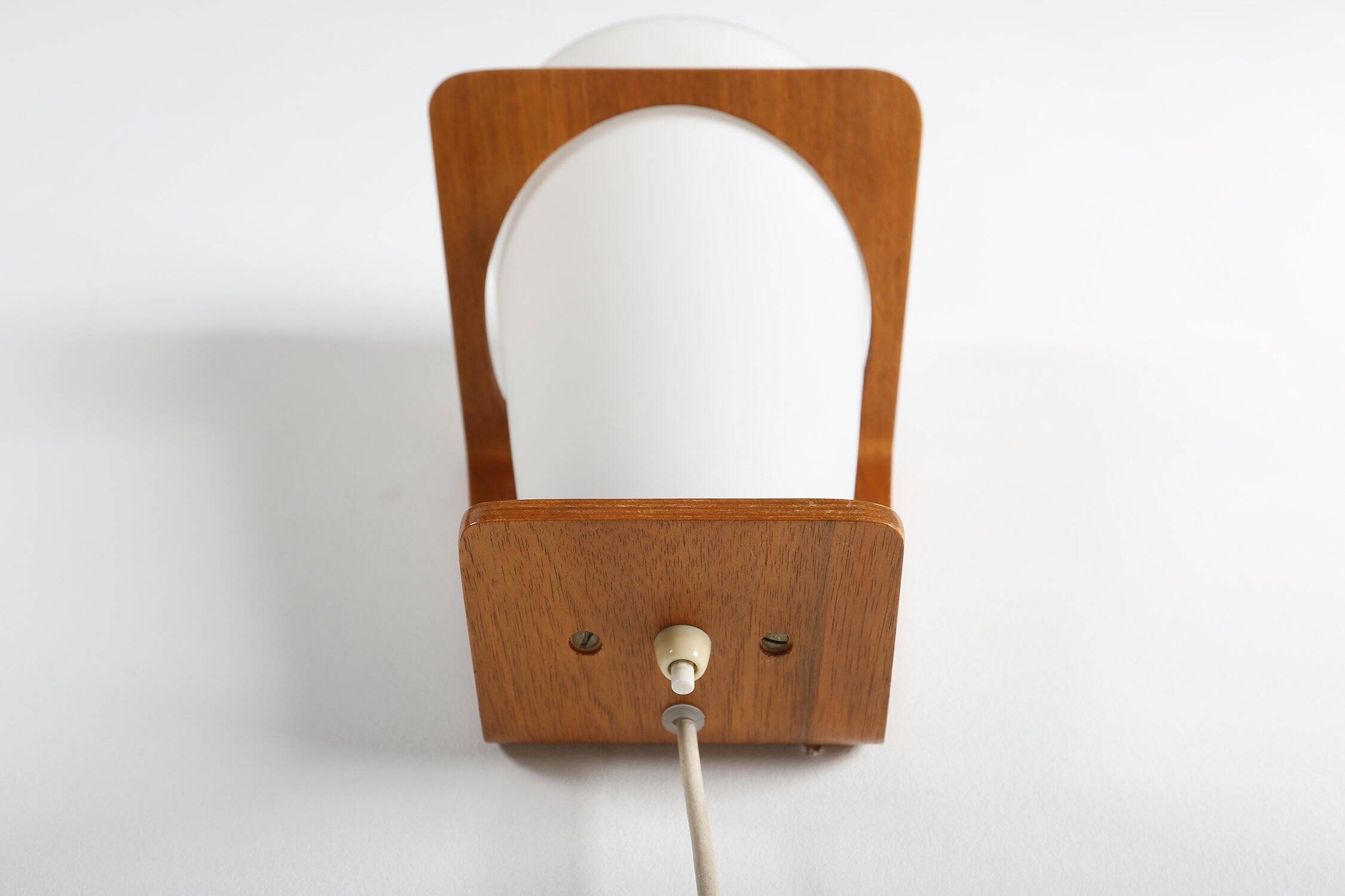 Wall Lamp in Curved Teak Plywood by Louis Kalff for Philips, 1959