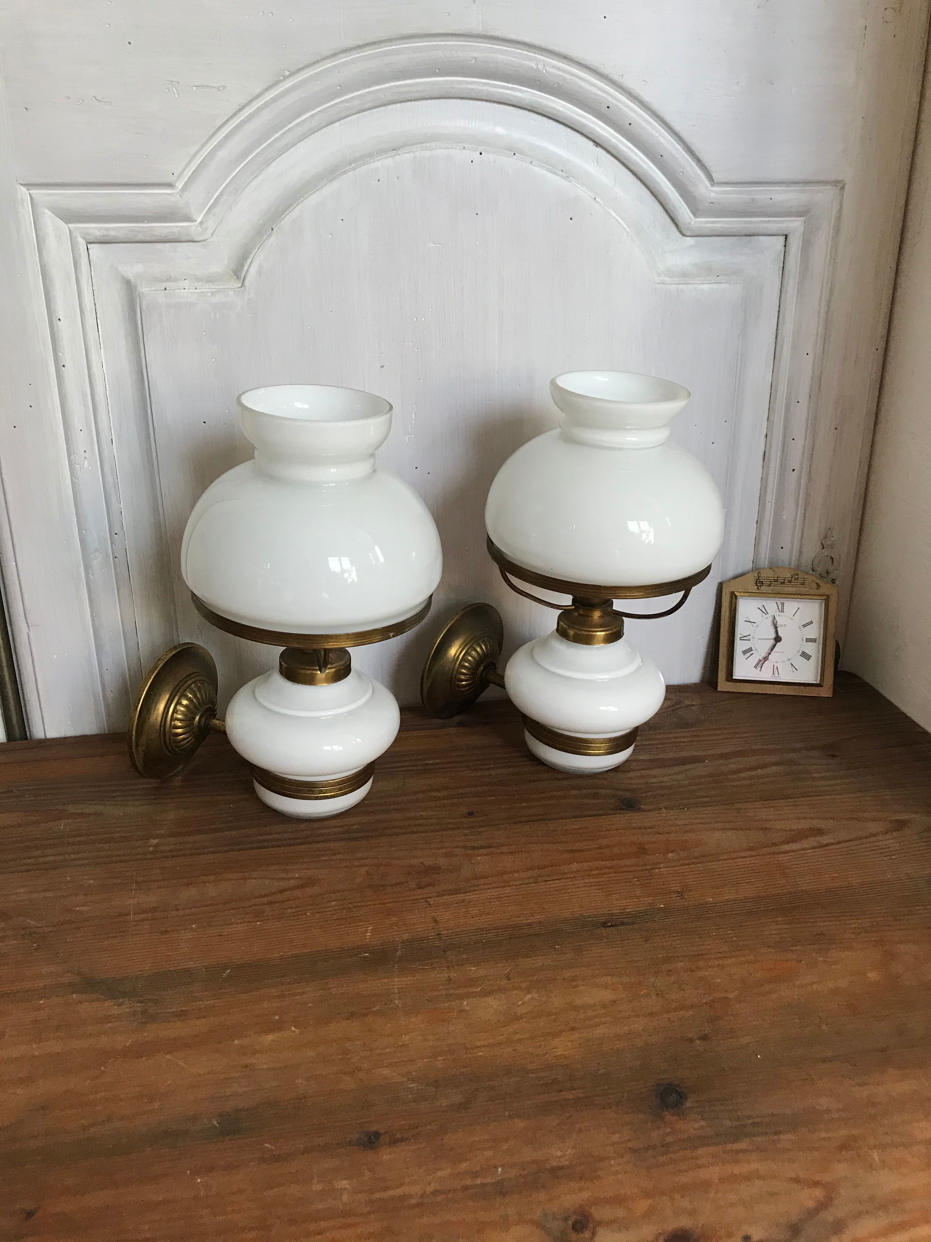 Pair of brass and opaline sconces