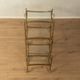 Set of 3 vintage Hollywood Regency nesting tables with brass frame and glass tops (1960s)