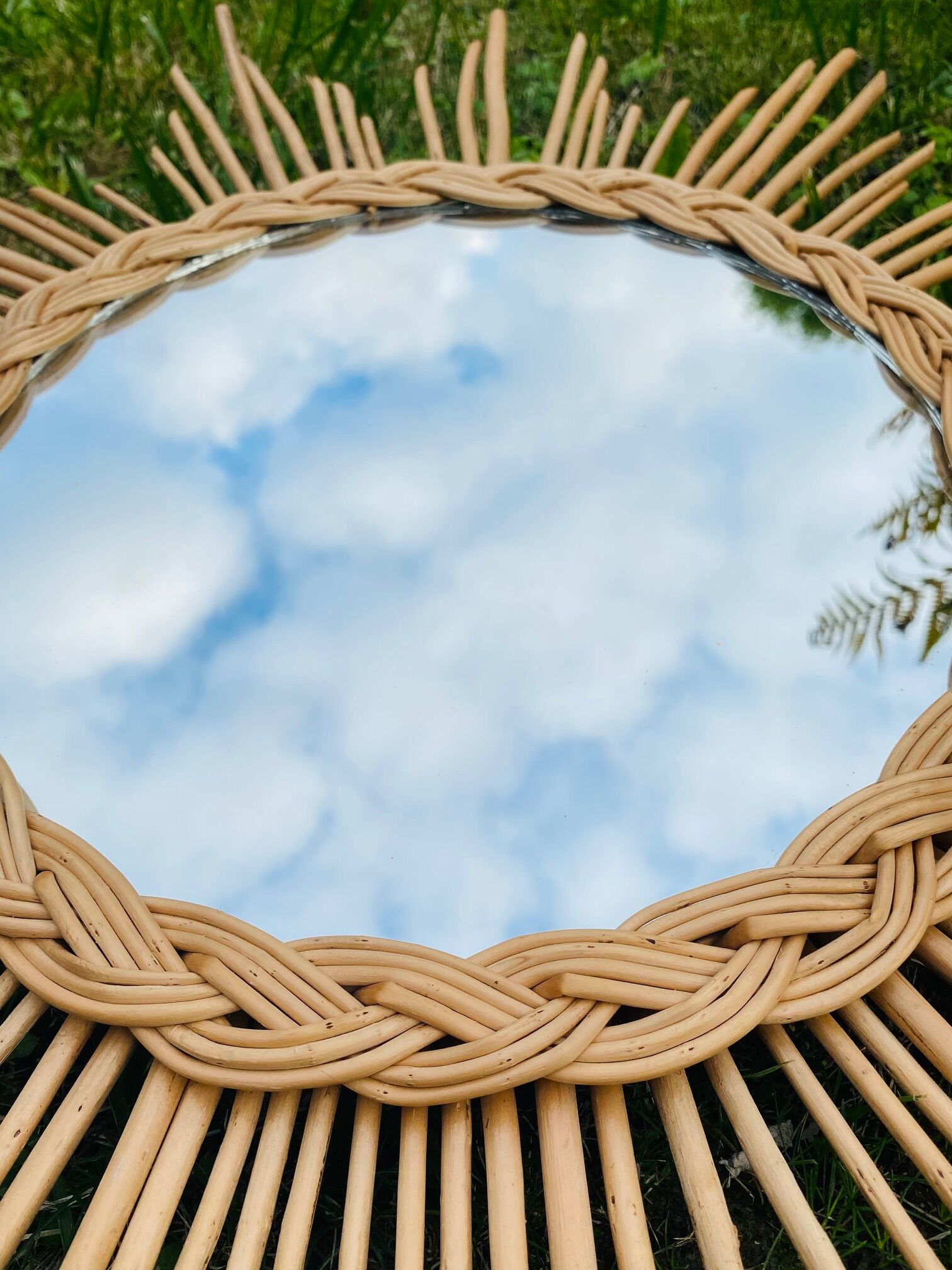 Vintage sun mirror in braided rattan and bamboo 60s/70s.
