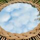 Vintage sun mirror in braided rattan and bamboo 60s/70s.