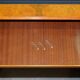 Partner desk in burr walnut designed to conceal computer equipment.