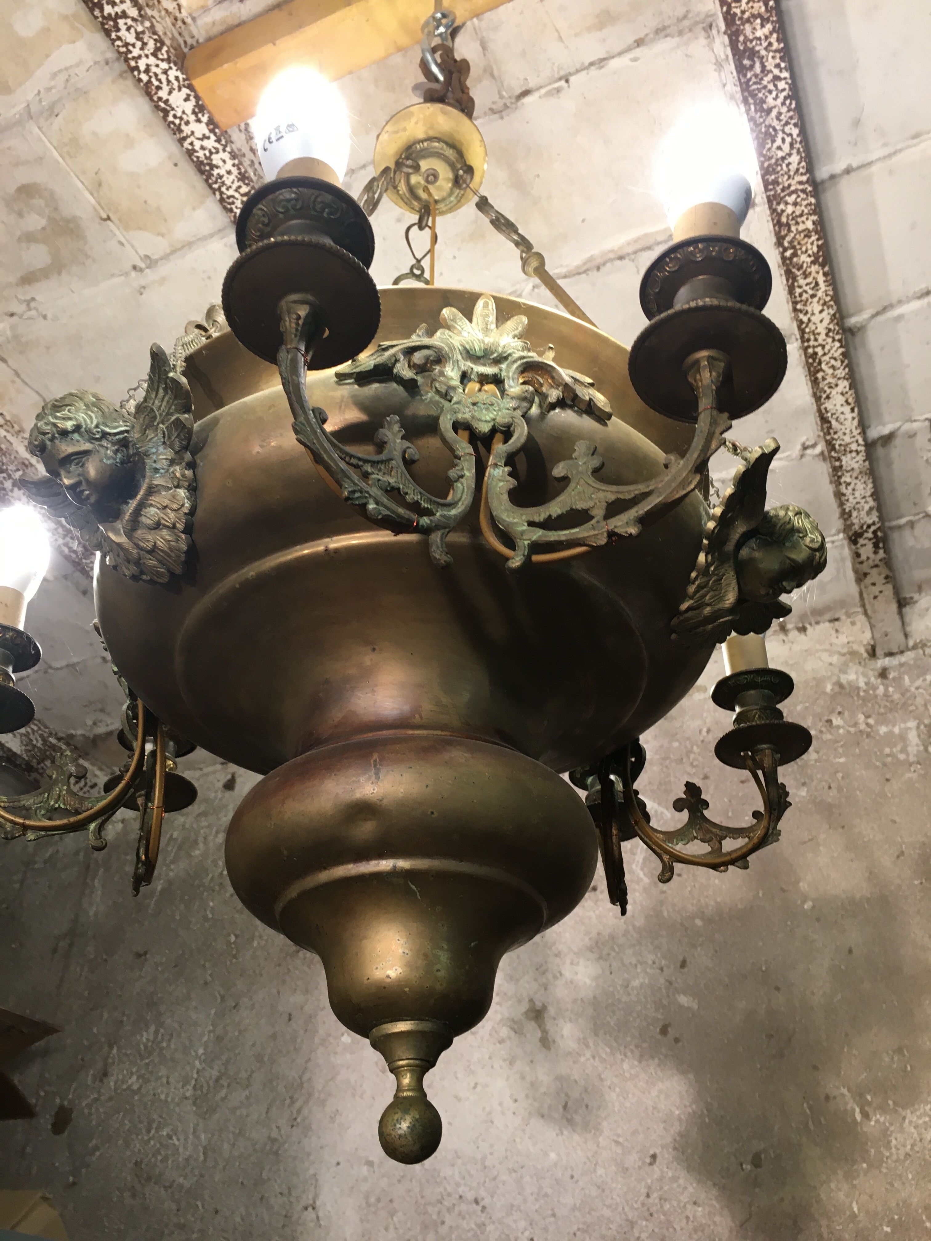 Brass chandelier with angels