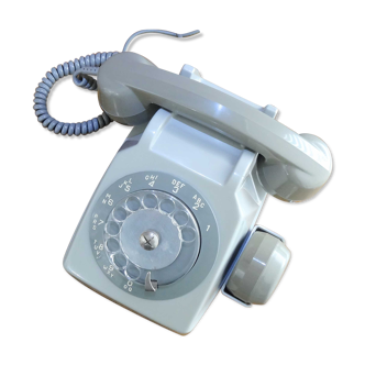 Téléphone à cadran rotatif vintage gris avec écouteur