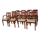 set of 10 chairs and two mahogany armchairs in Hepplewhite style