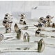 12 silver-plated metal duck knife rests with crystal.