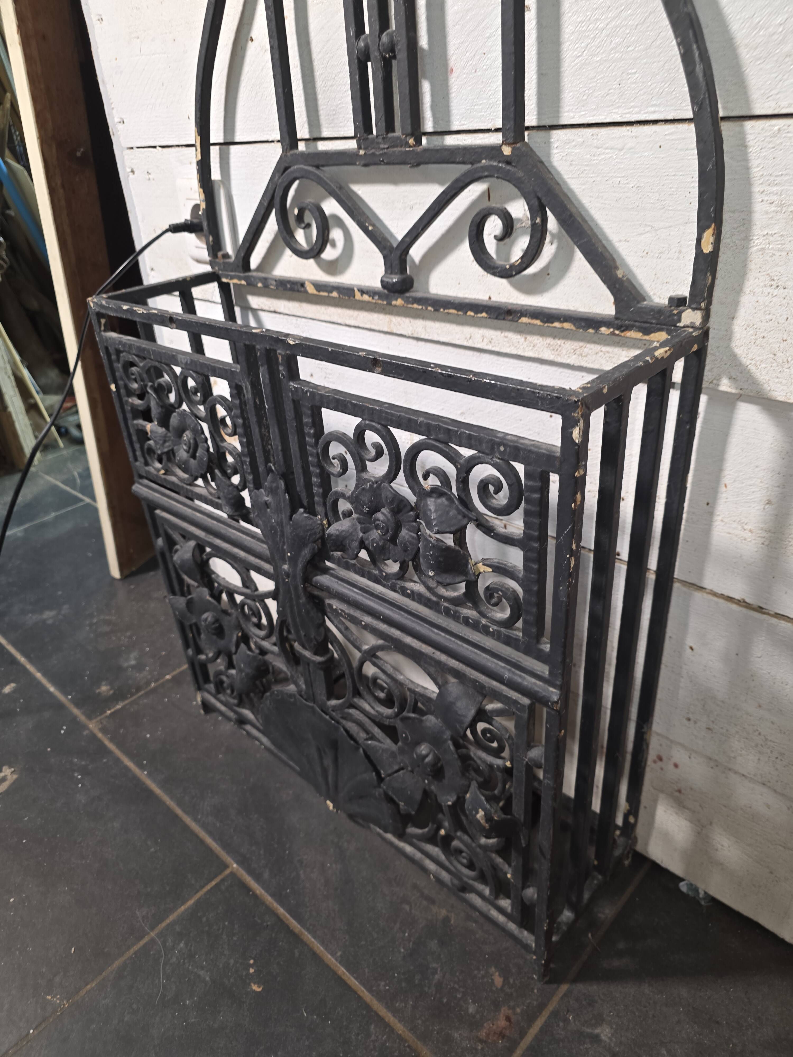 Art Deco coat rack wardrobe in wrought iron from the 1930s.