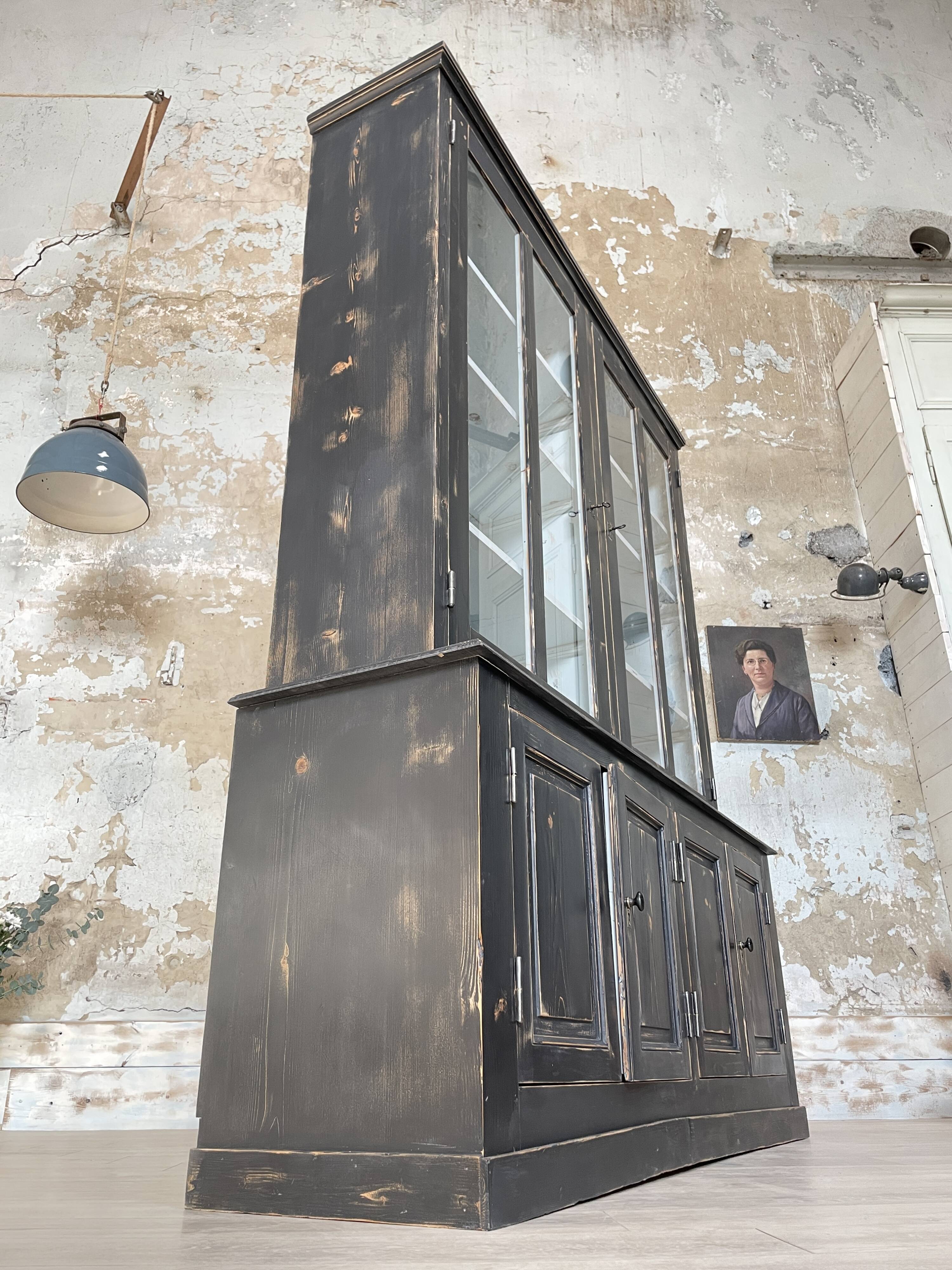 Display cabinet in patinated wood