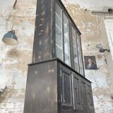 Display cabinet in patinated wood