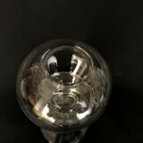 Glass oil lamp blows on foot shower