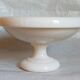 Standing cup in old white marble