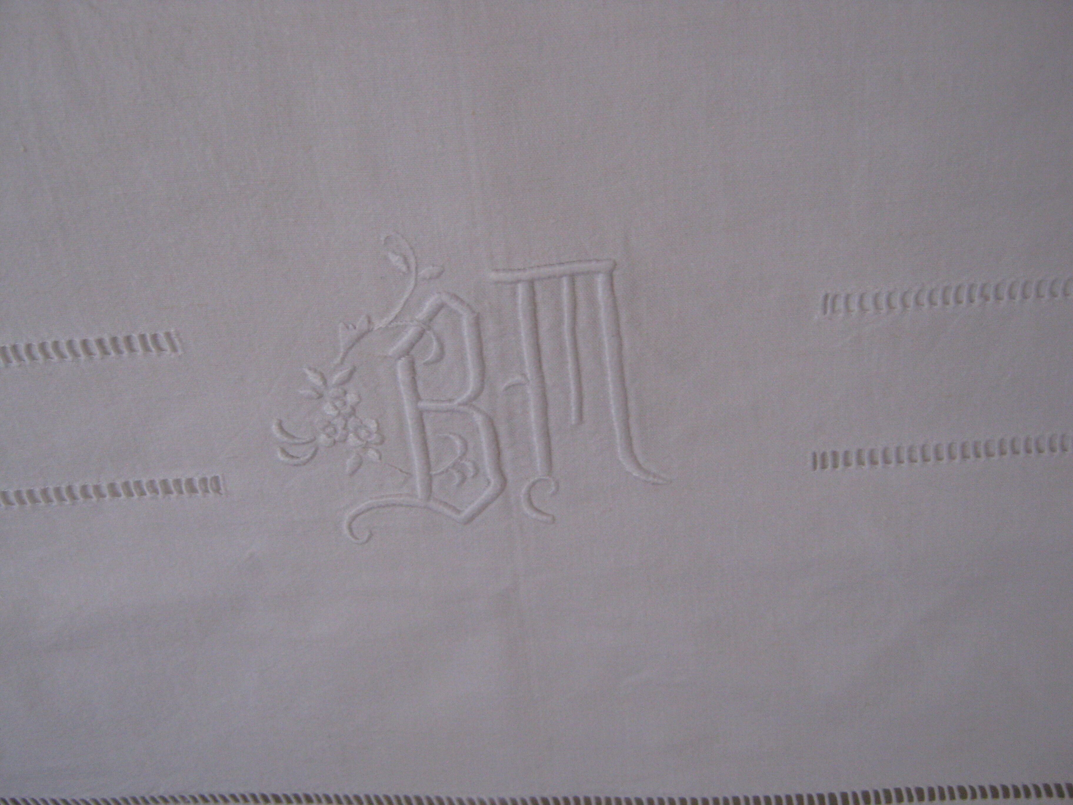Old embroidered white Métis sheet