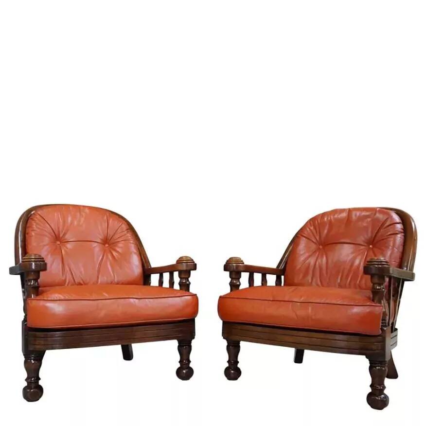Pair of 60s armchairs in leather and wood