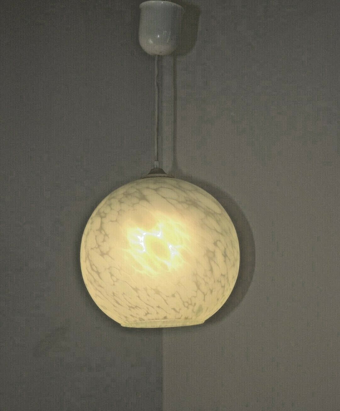 French suspended ceiling light in the shape of a white ball, Clichy 3336 glass shade.