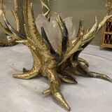 Round glass and brass table by designers Richard and Isabelle Faure