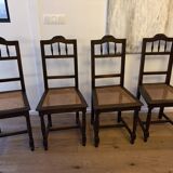 Lot of 4 solid oak chairs with caning in the Henri II style.