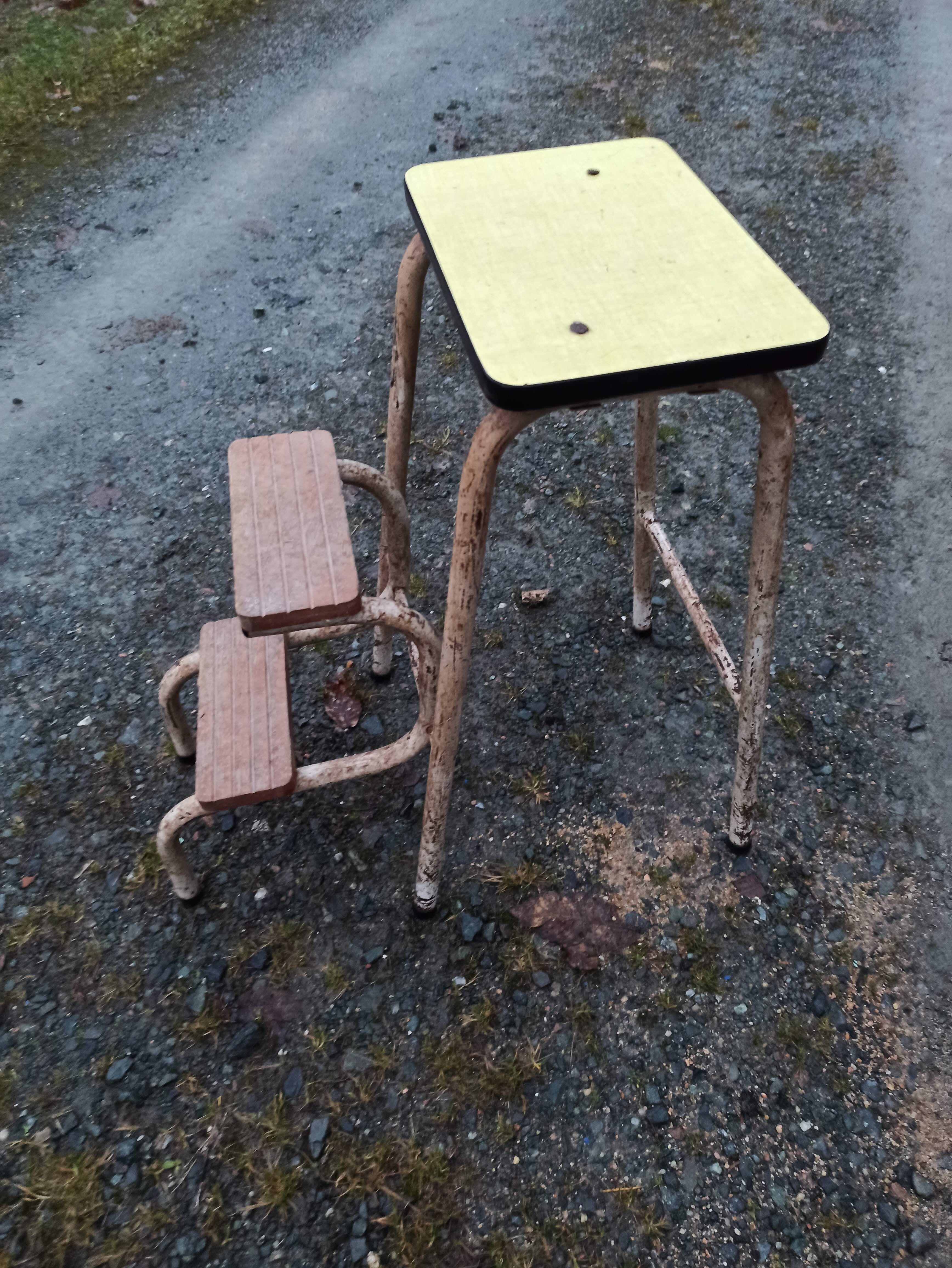 Yellow formica stool stepladder step