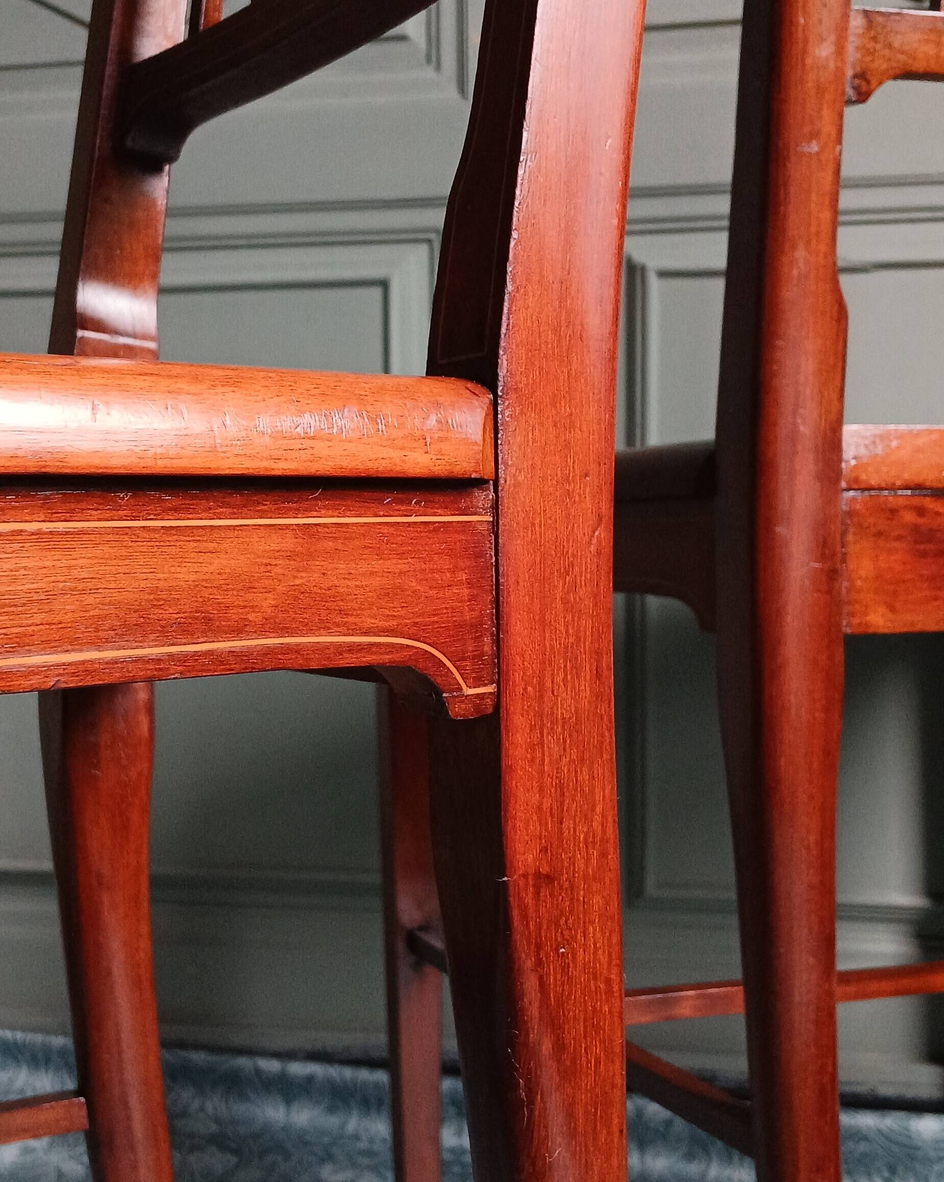 Pair of caned mahogany chairs, circa 1930.