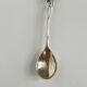Silver spoon with amber