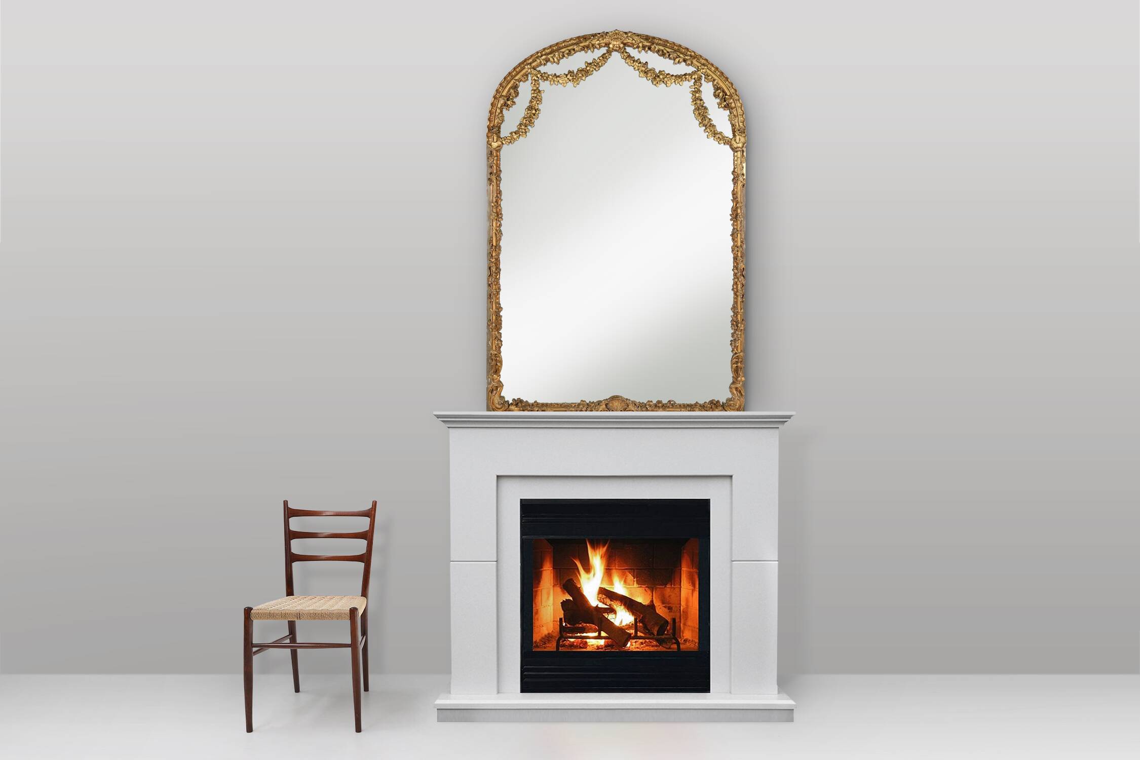 Large baroque decorated chimney mirror in gilted wood, France ca. 1800