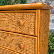 Dresser and its bedside table in rattan caning and vintage oak from the 1970s.