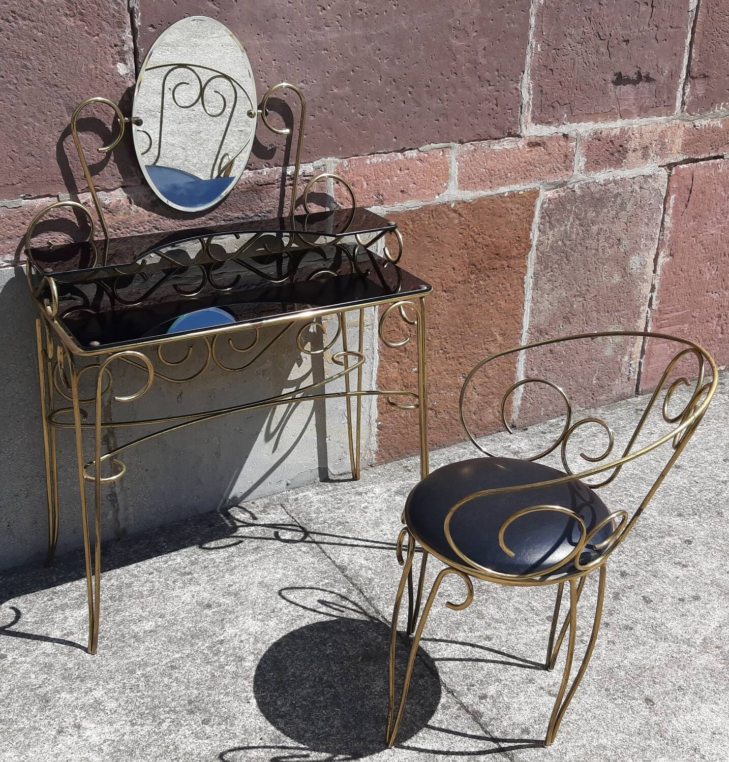 Dressing table and chair in gilded metal and opaline glass.