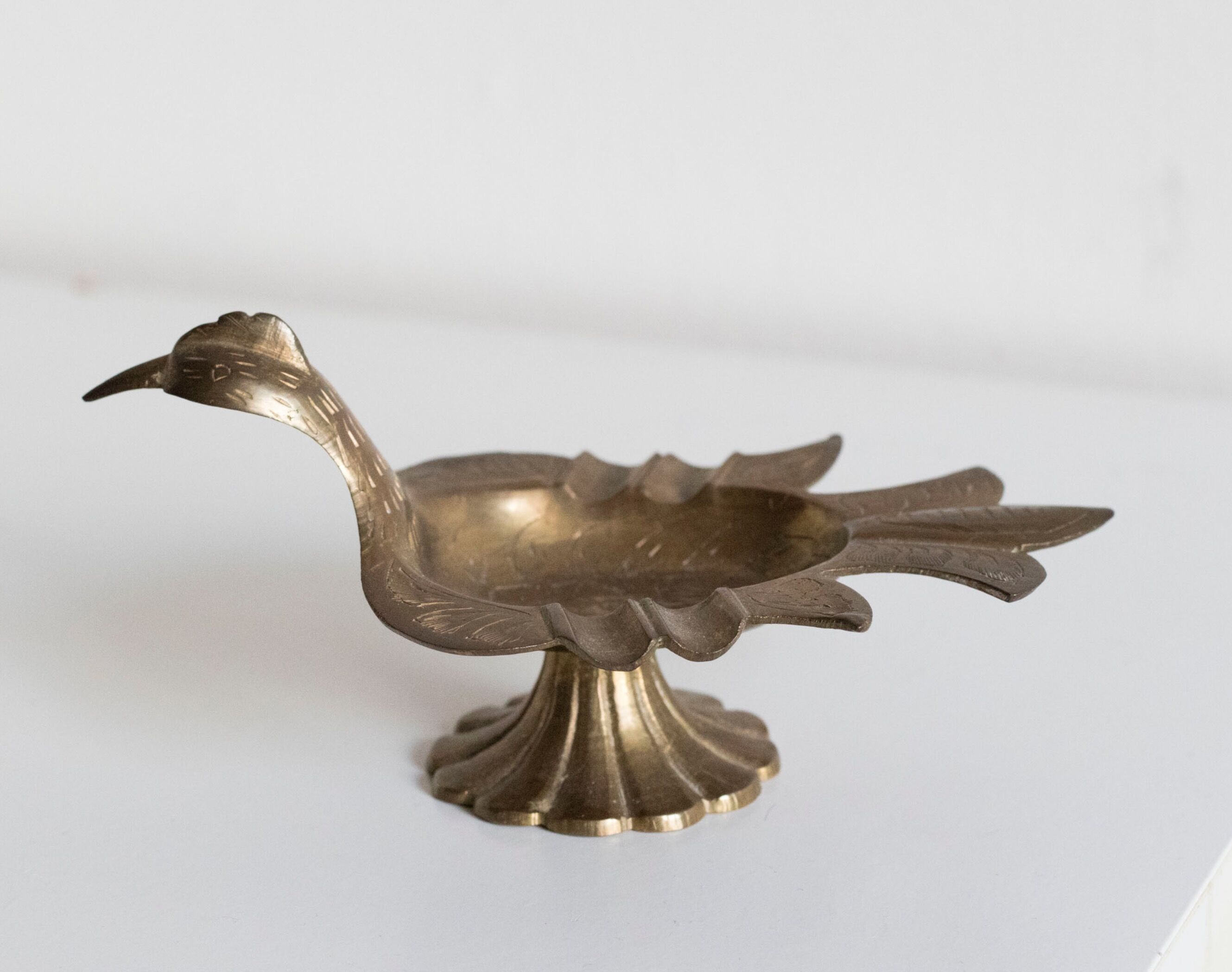 Empty pocket / old brass ashtray