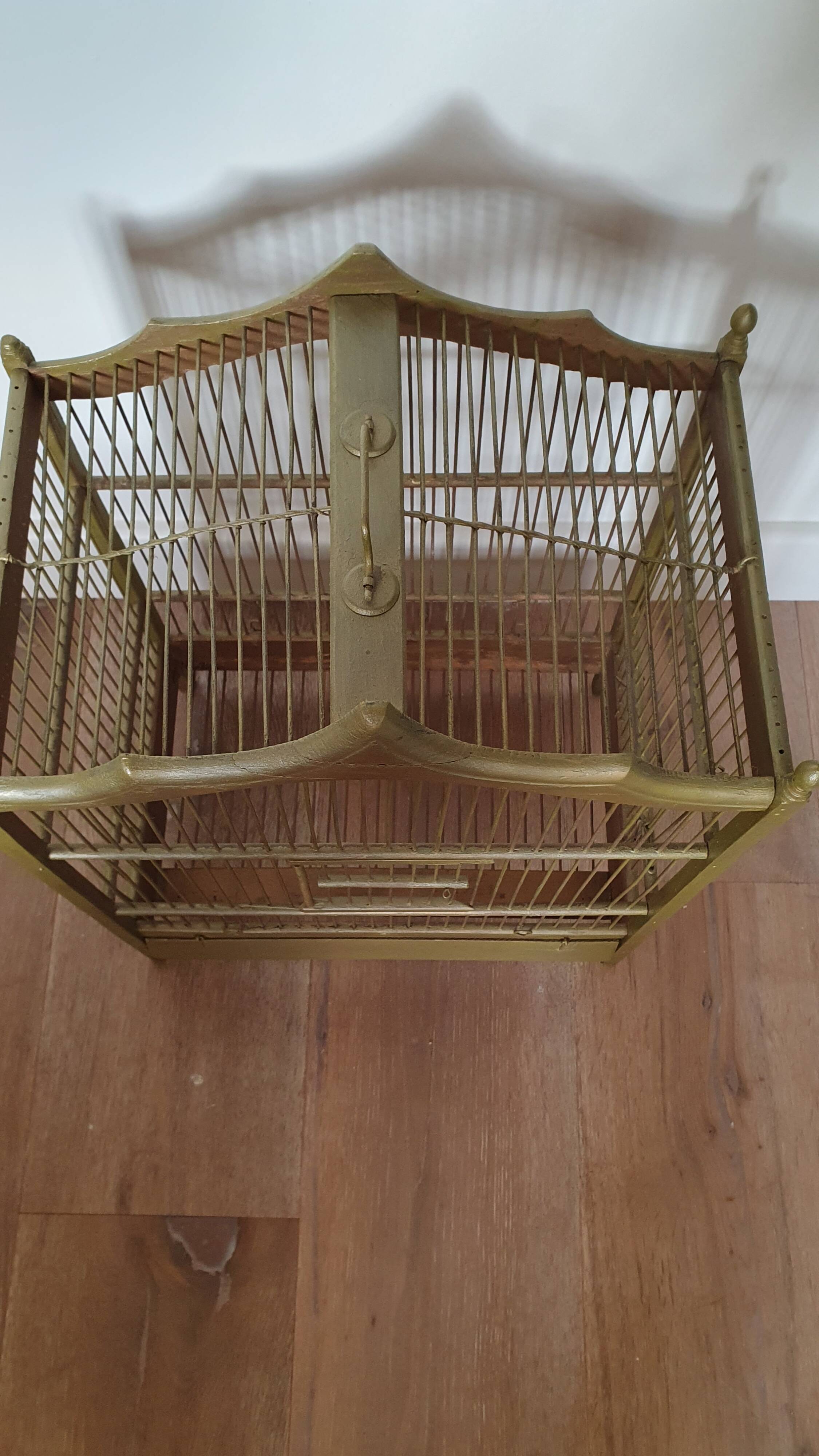 Wooden and gilded metal birdcage
