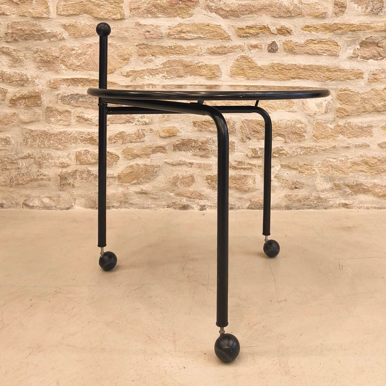 Foldable metal side table, design by Tord Bjorklund, Ikea.