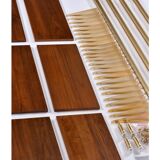 Tension pole free standing rose gold aluminum Omni wall unit by George Nelson