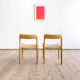 Paire de chaises de salle à manger modèle 75 par Niels O. Møller en chêne