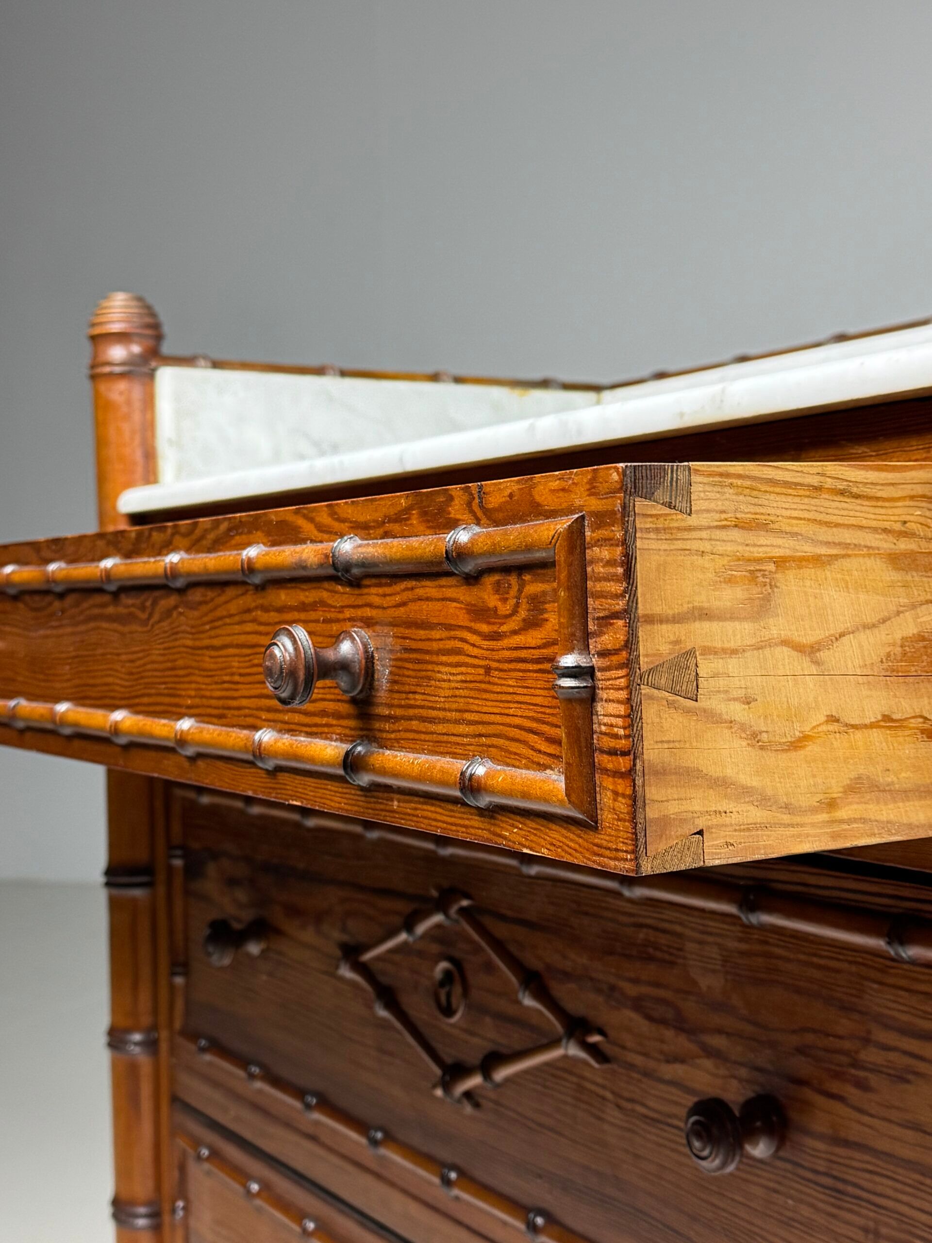 Faux bamboo chest of drawers 1900