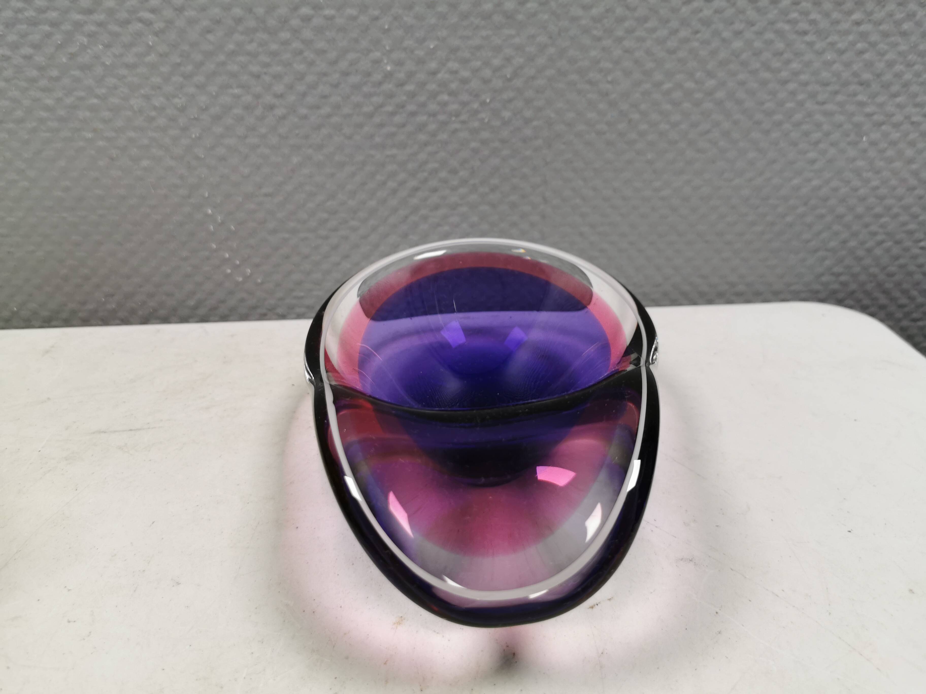 Beautiful dish/bowl in many coloured glass.