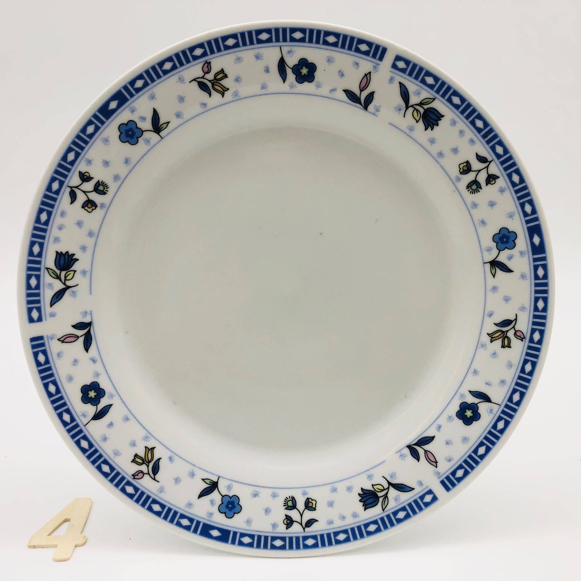 6 “Chriss G. Collection” porcelain dessert plates.