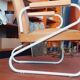 60s armchair with tubular legs, Ronéo style