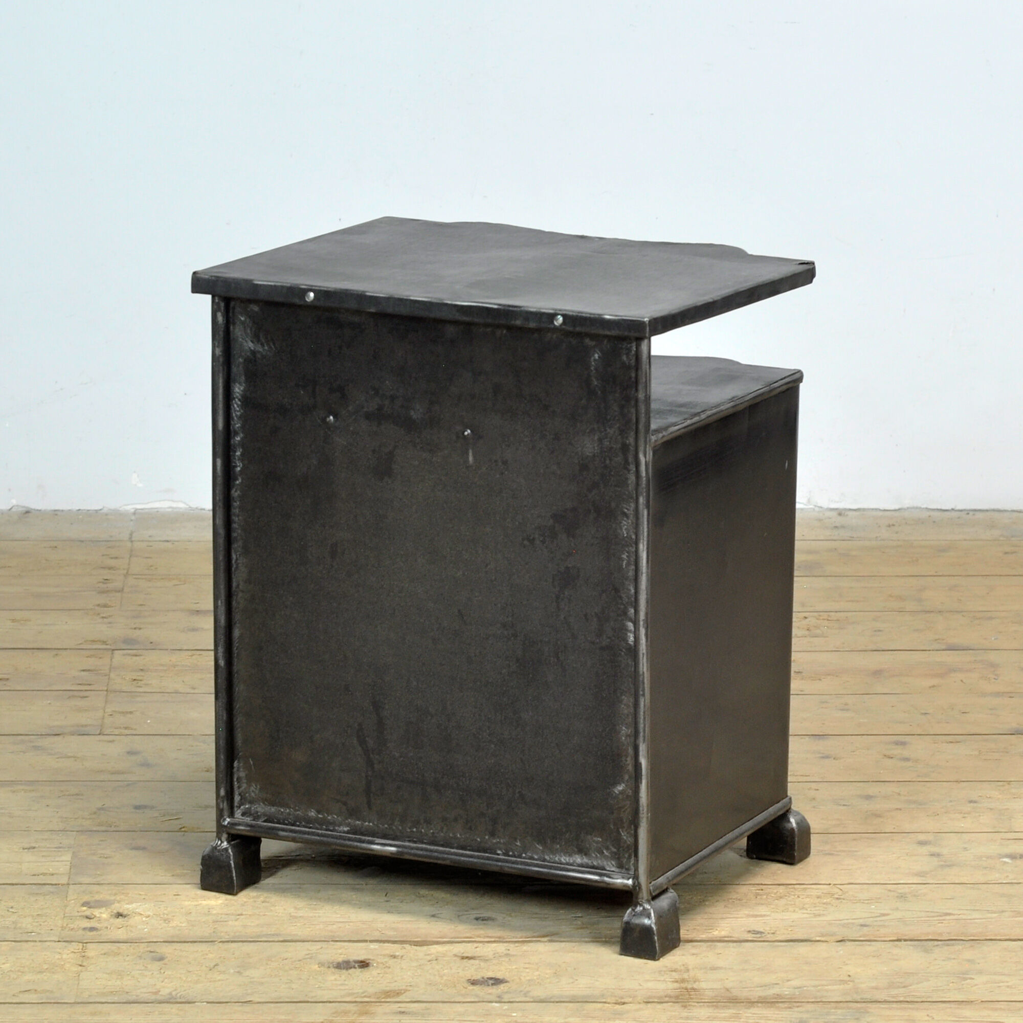 Iron bedside table, circa 1930