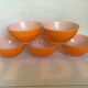 Five old orange duralex bowls