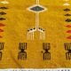 Mustard yellow kilim carpet with multicolored berber patterns