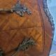 Curved chest of drawers in Louis XV style marquetry