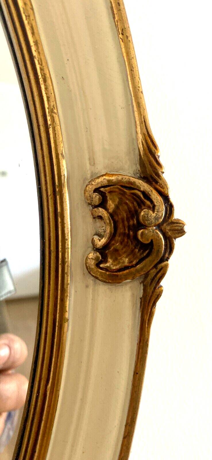 Mirror in wood and stucco with gilded highlights 20th century