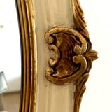 Mirror in wood and stucco with gilded highlights 20th century
