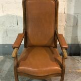 Old Voltaire armchair in light brown leather