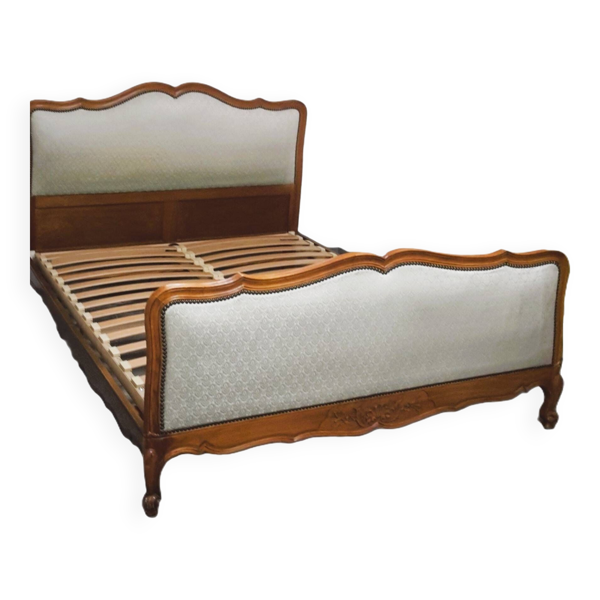 Cabinetmaker's bed frame and matching upholstered bedspread
