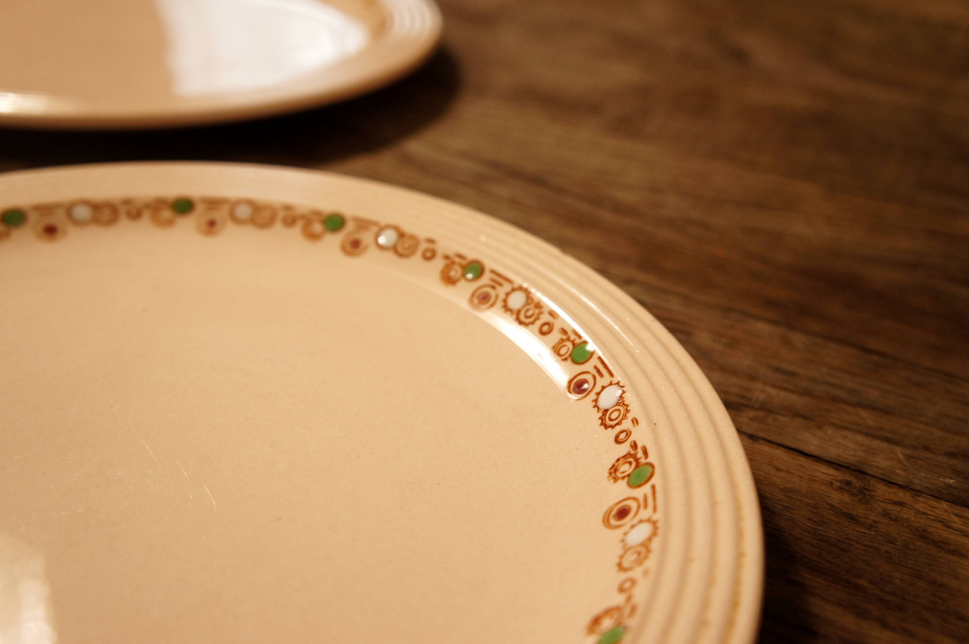 Set of 7 flat plates Longwy "Betty" art deco