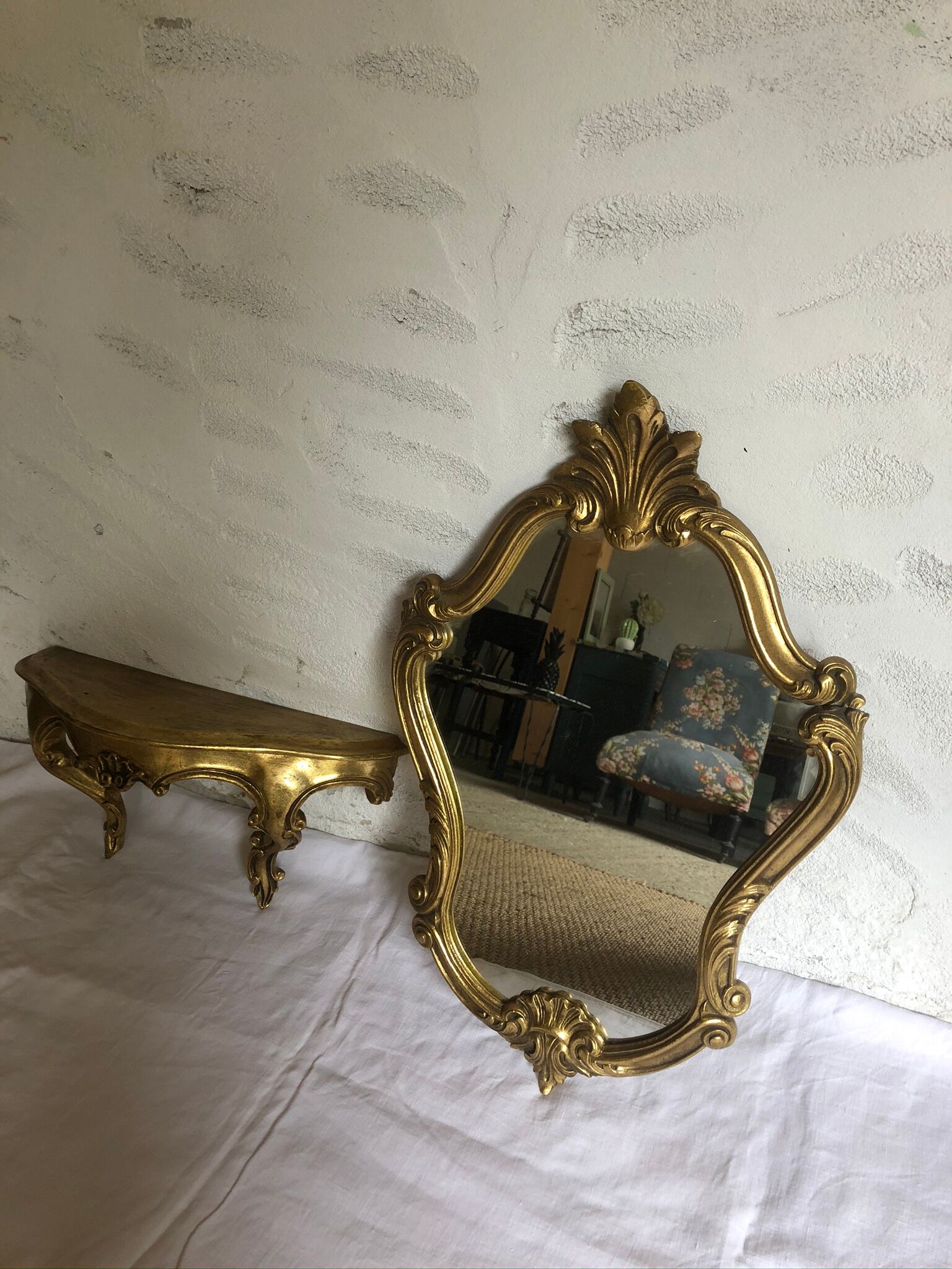 Old golden mirror and console