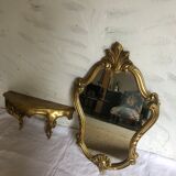 Old golden mirror and console